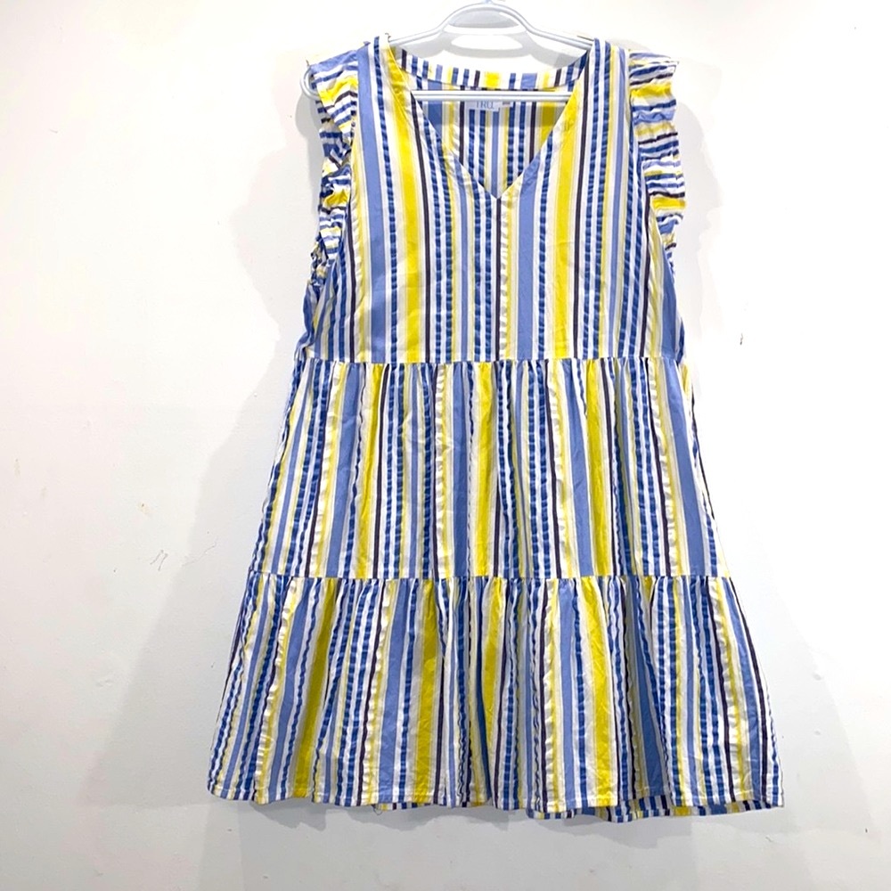 Yellow and blue striped sleeveless sundress with ruffled shoulders and pockets